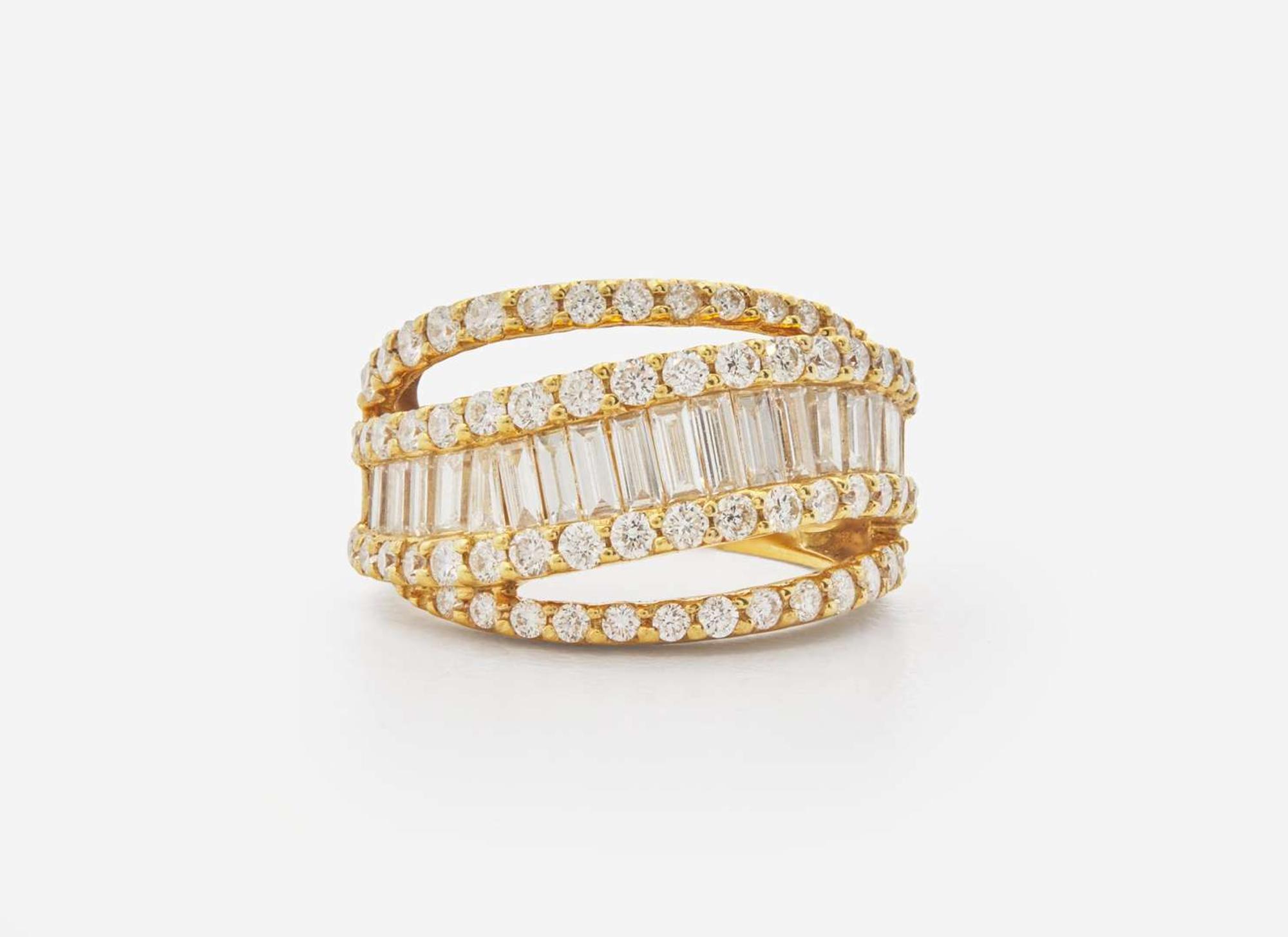 A Ladies 18K Yellow Gold and Diamond Ring