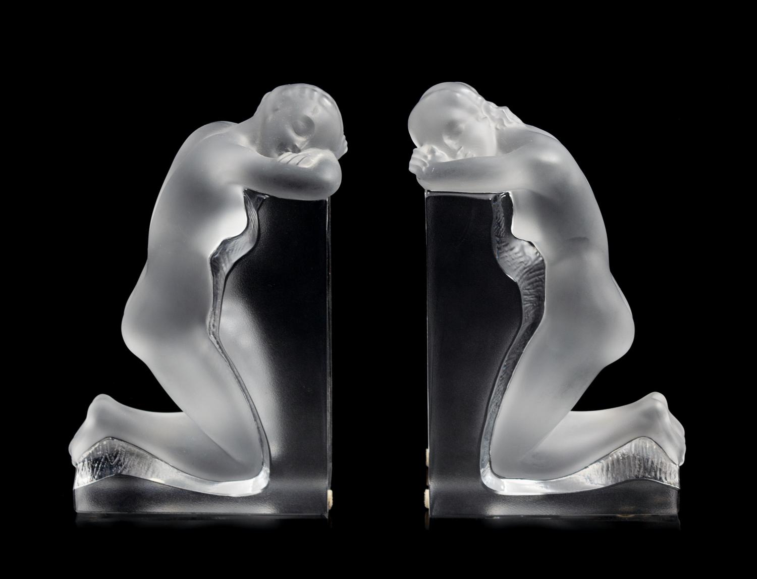 A Pair of Lalique Reverie Bookends Height 8 5/8 x width 5 1/4 x depth 2 inches