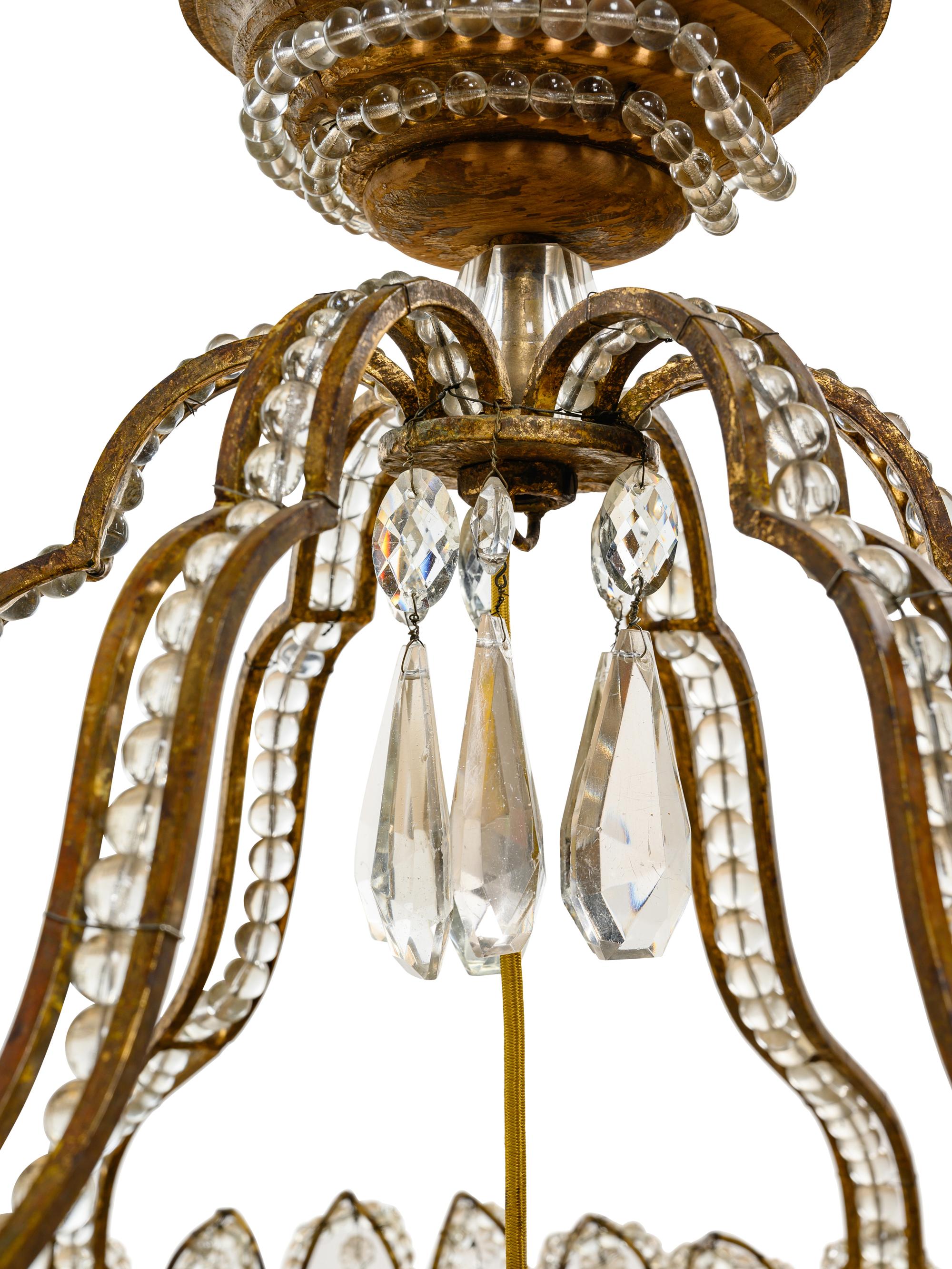 An Italian Beaded Gilt Metal Six-Light Chandelier with a Rope Canopy