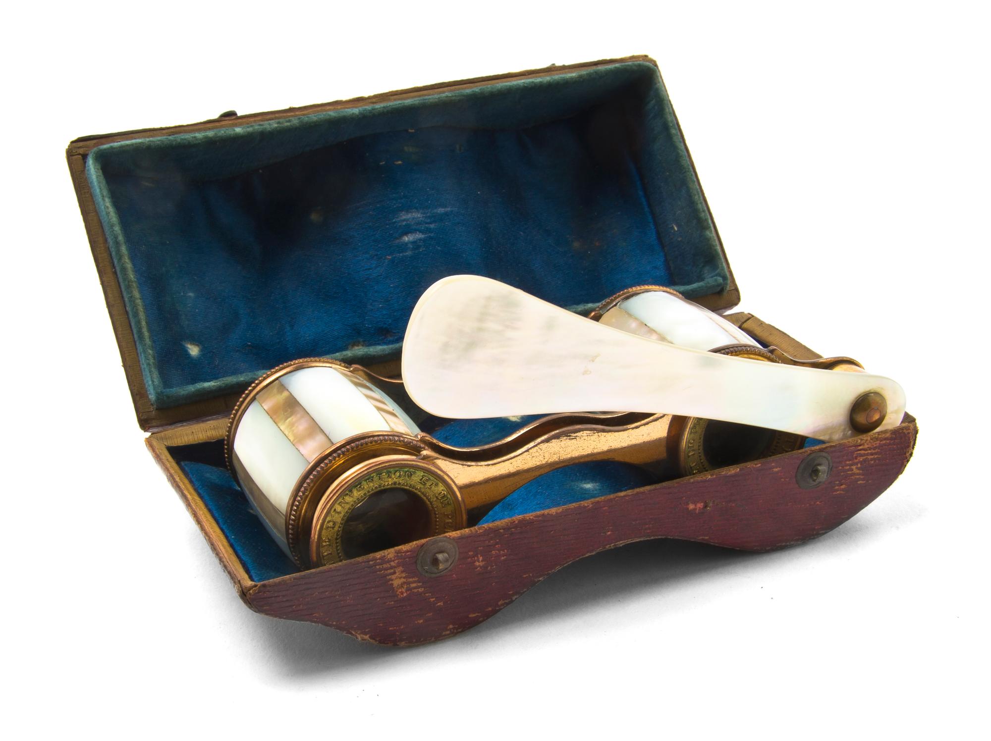 A Pair of French Mother-of-Pearl Veneered Opera Glasses, Lunette, Width 3 5/8 inches.