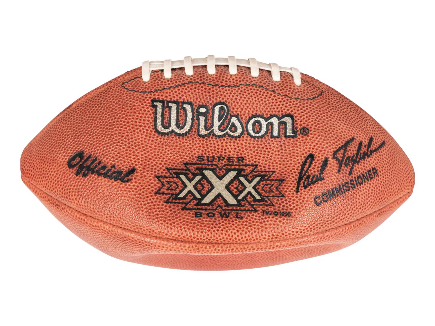 A Group of Eight Wilson Super Bowl Official Footballs and Promotional Poster,