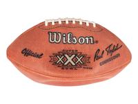 A Group of Eight Wilson Super Bowl Official Footballs and Promotional Poster,