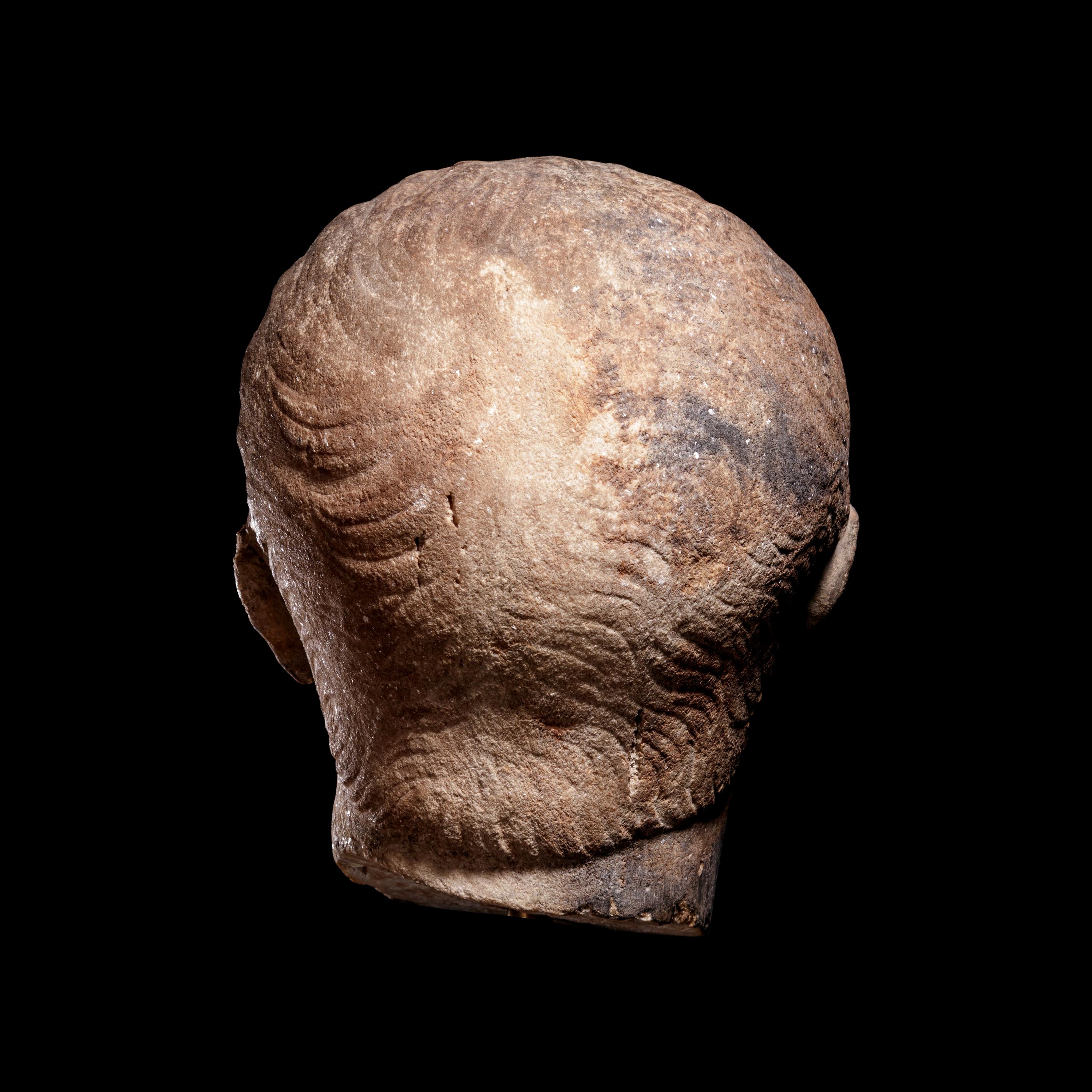 A Roman Marble Portrait Head of Emperor Trajan