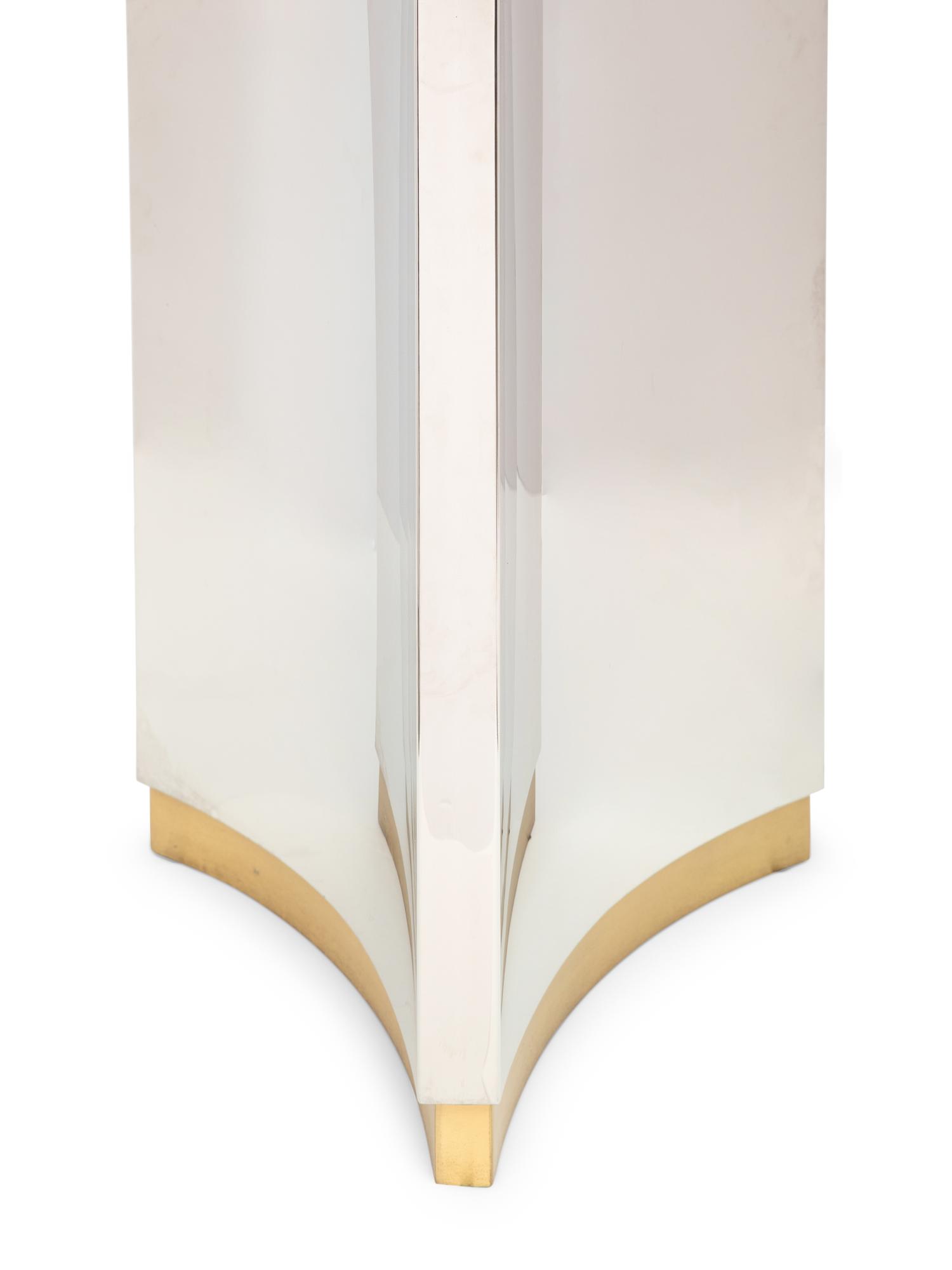 A Brass and Stainless Steel Pedestal Dining Table