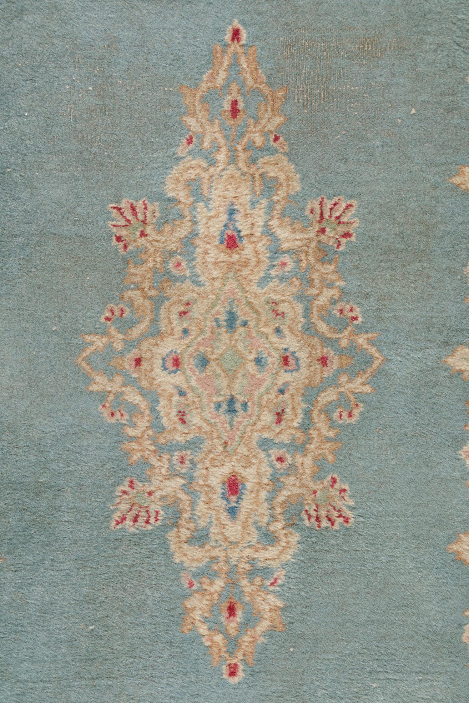 A Kirman Wool Rug