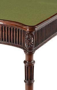 A Pair of George III Mahogany Serpentine Flip-Top Tables