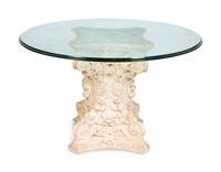A Composition Column Capital and Glass Table