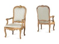A Pair of Italian Rococo Painted and Parcel Gilt Armchairs
