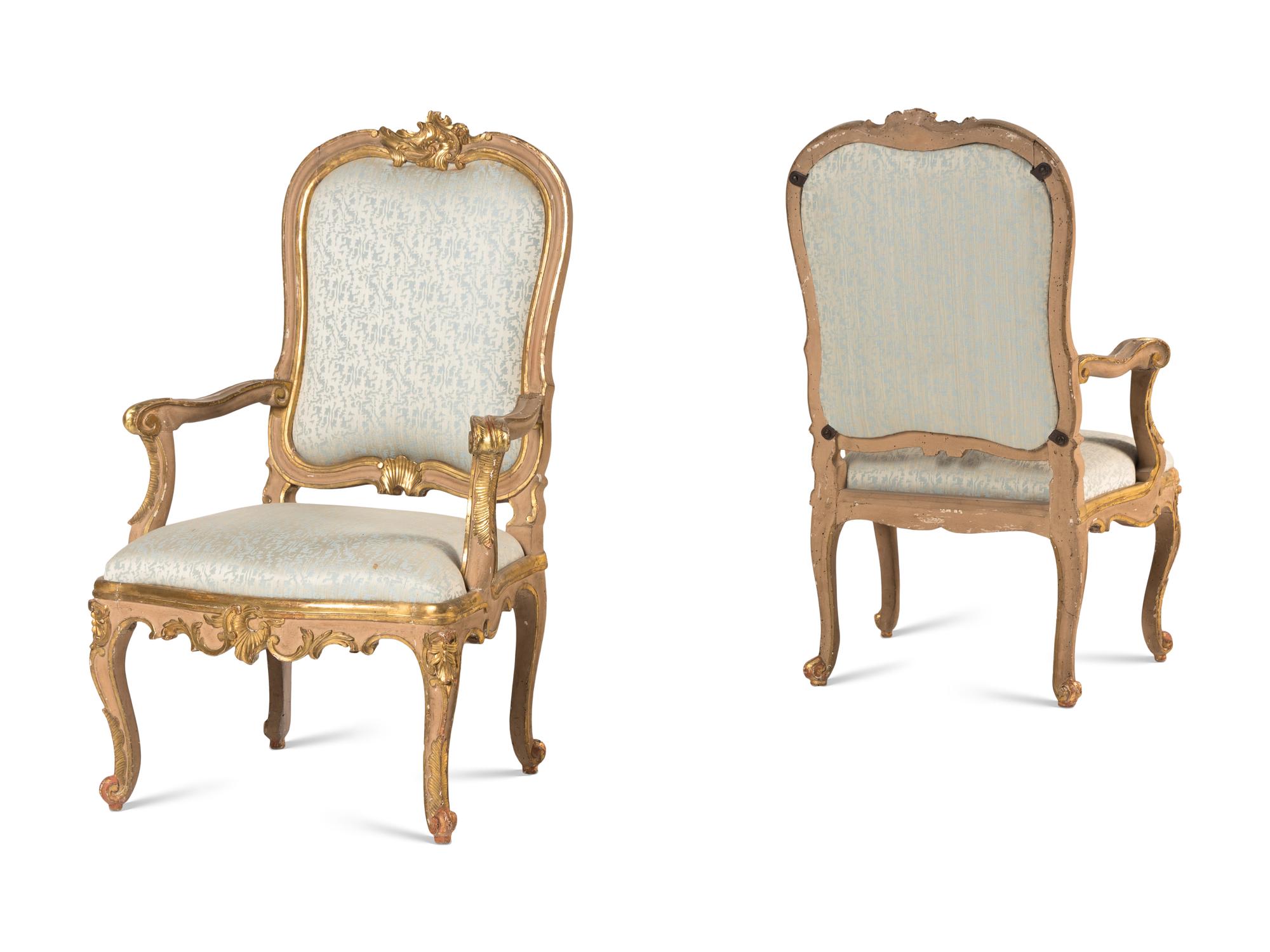 A Pair of Italian Rococo Painted and Parcel Gilt Armchairs