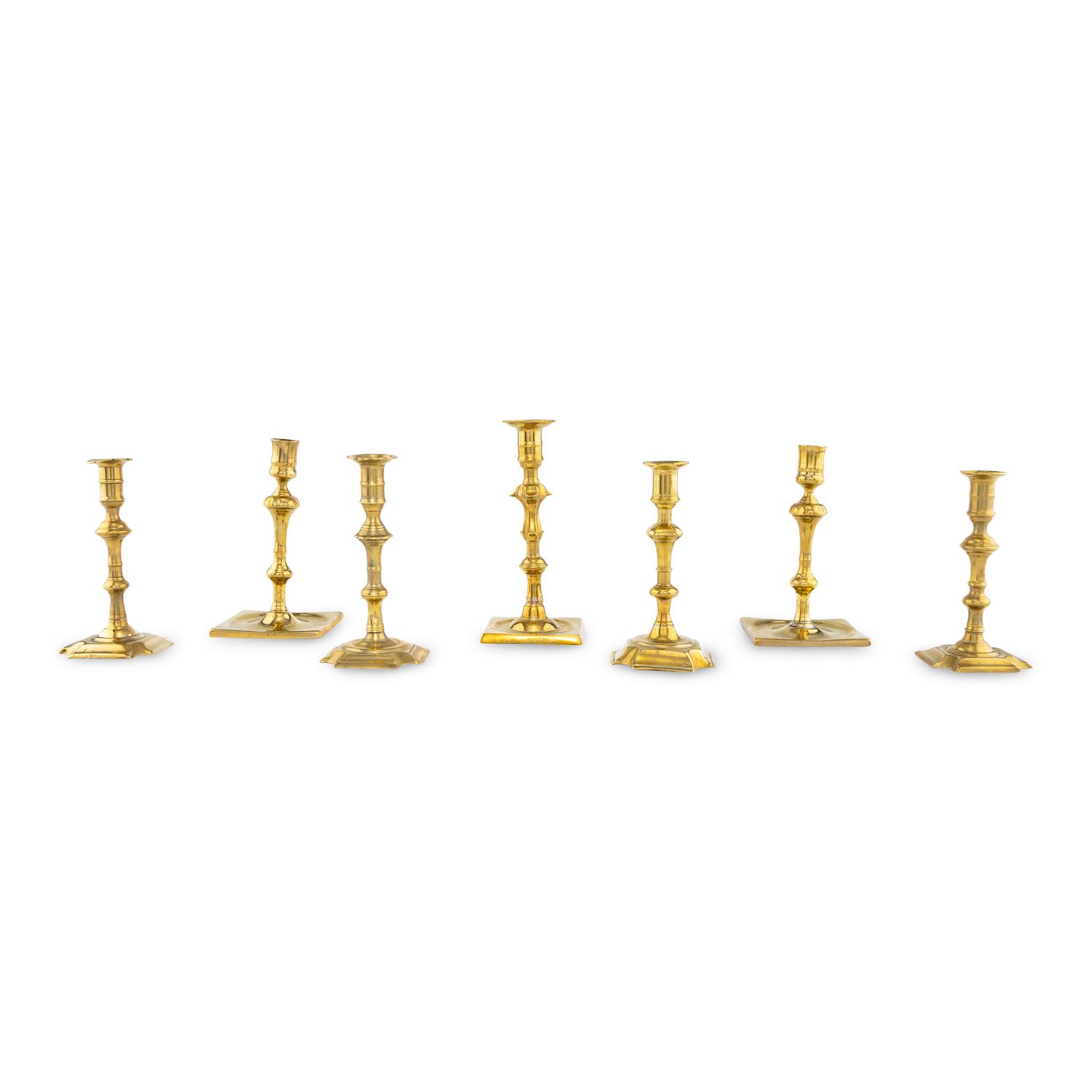 A Group of Seven Brass Candlesticks