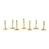 A Group of Seven Brass Candlesticks