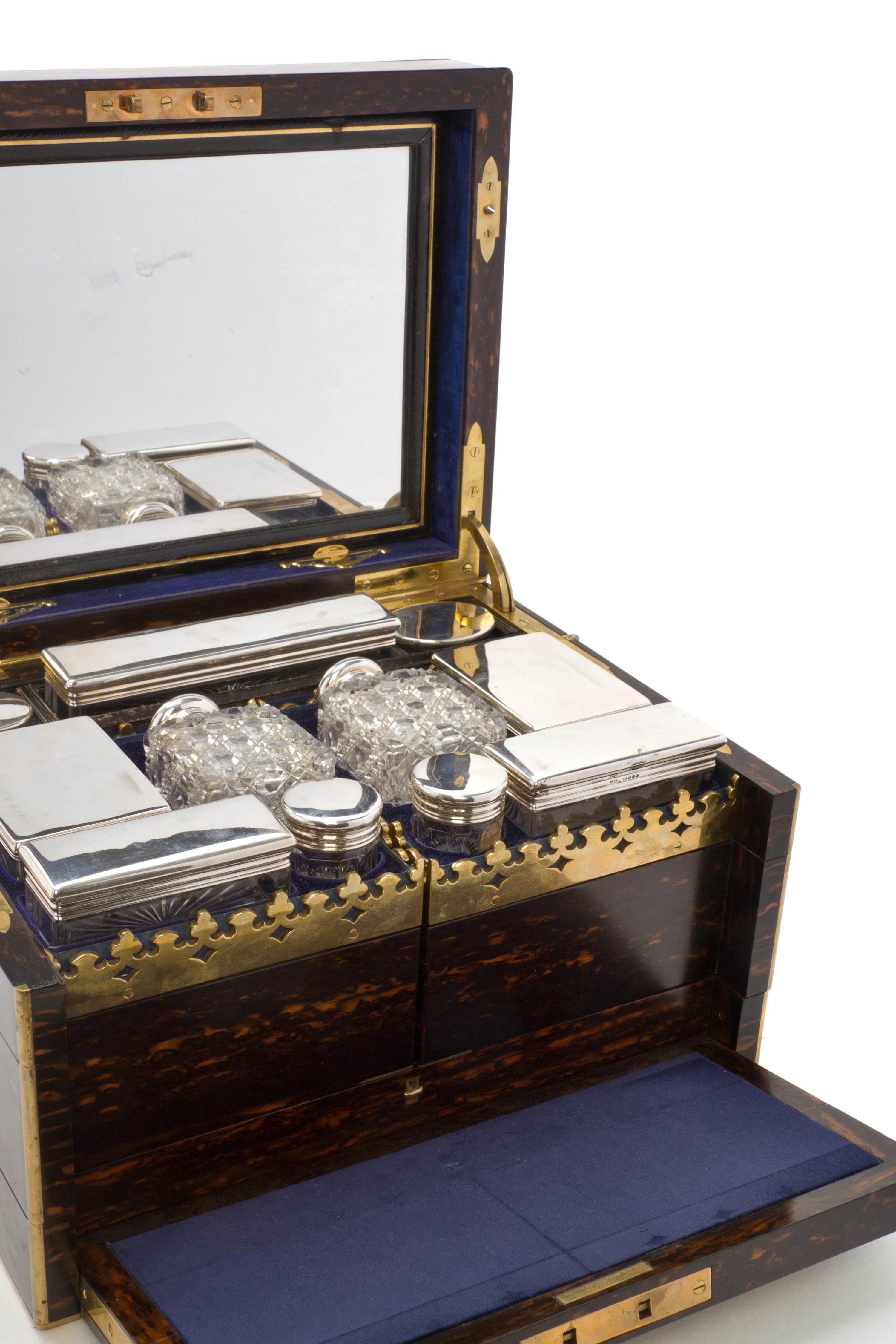A Victorian Calamander, Silver and Cut Glass Dressing Box, RETAILED BY HOWELL, JAMES & CO., LONDON, Height 8 1/4 x width 13 1/2 x depth — RETAILED BY HOWELL, JAMES & CO., LONDON,