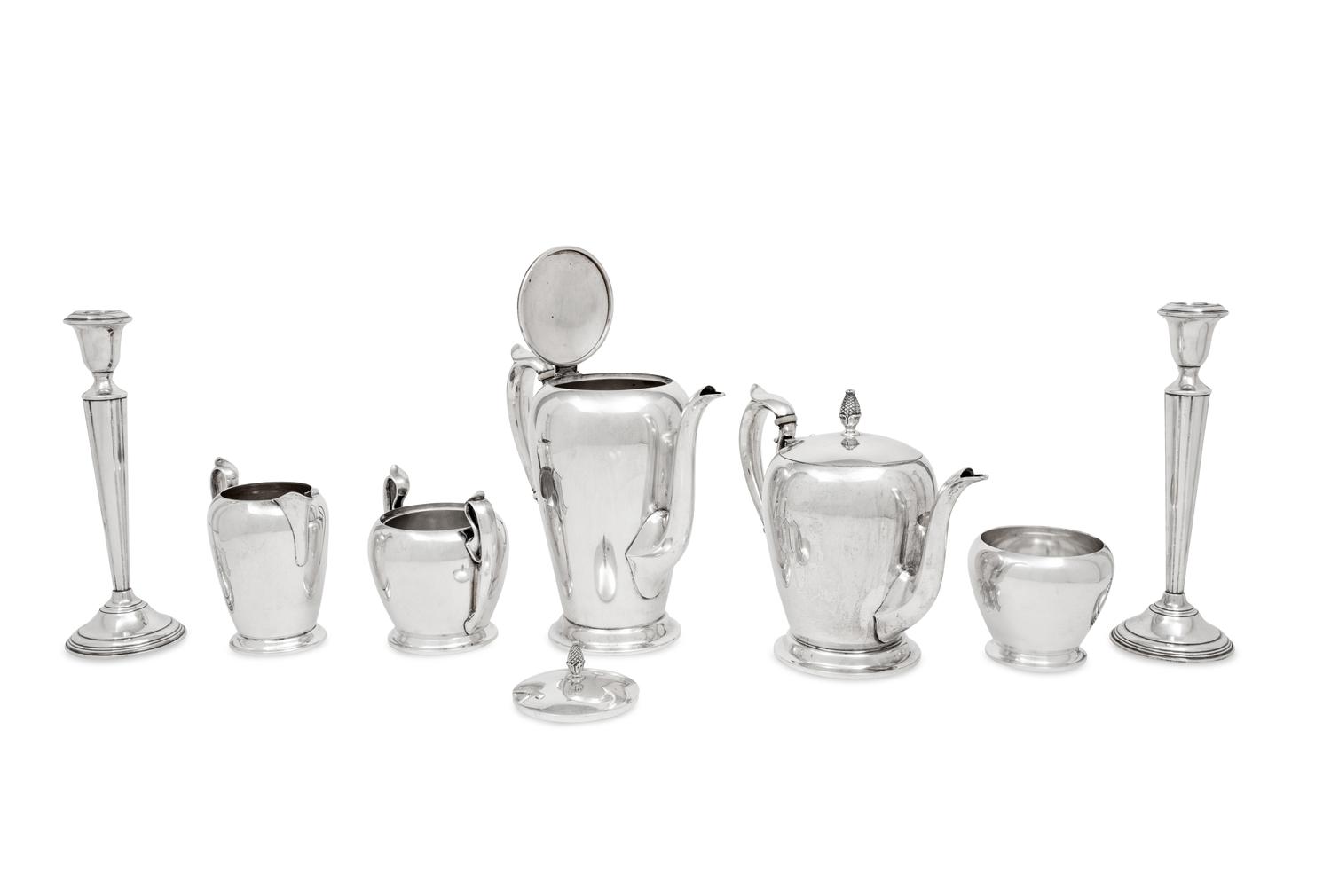 An American Silver Five-Piece Tea and Coffee Service and a Pair of Cartier Silver Candlesticks