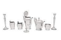 An American Silver Five-Piece Tea and Coffee Service and a Pair of Cartier Silver Candlesticks