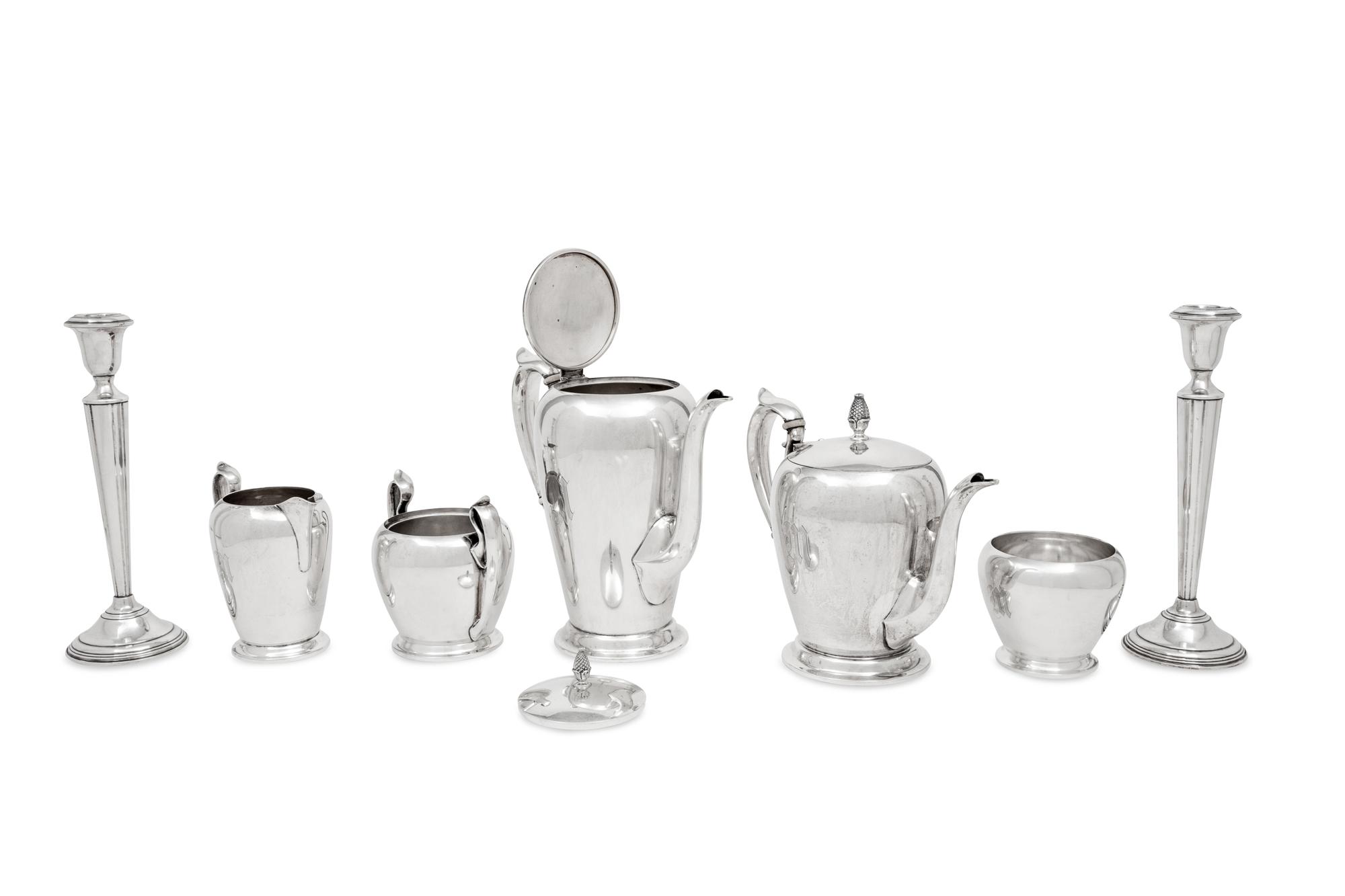 An American Silver Five-Piece Tea and Coffee Service and a Pair of Cartier Silver Candlesticks