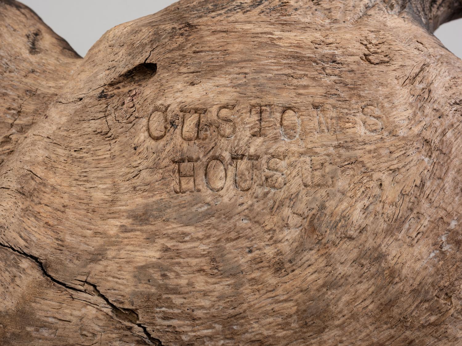 A Carved Walnut Customs House Eagle