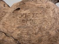 A Carved Walnut Customs House Eagle