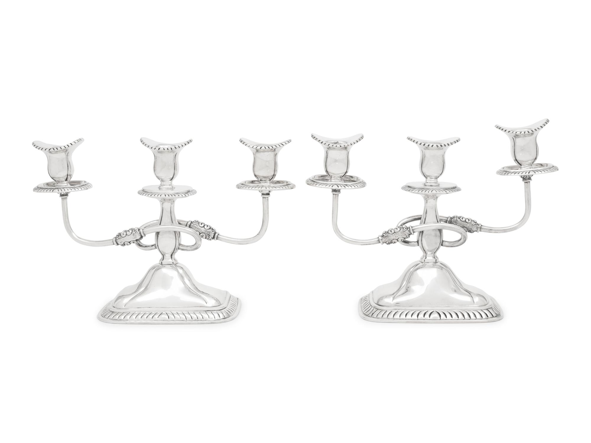 A Pair of Sanborns Silver Three-Light Candelabra