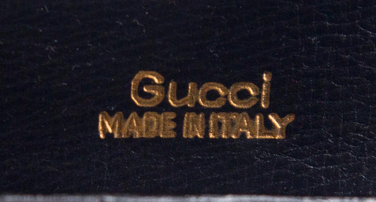 A Gucci Navy Skin Clutch, 8" x 5.5" x 2".