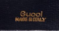 A Gucci Navy Skin Clutch, 8" x 5.5" x 2".