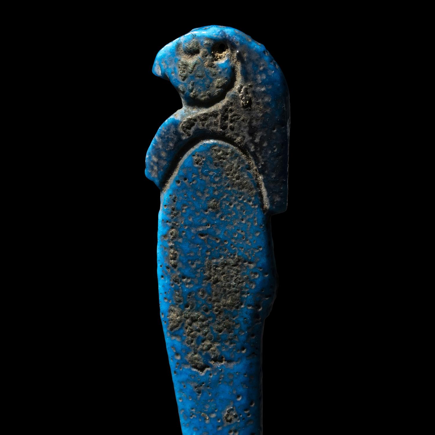 An Egyptian Faience Amulet of a Son of Horus