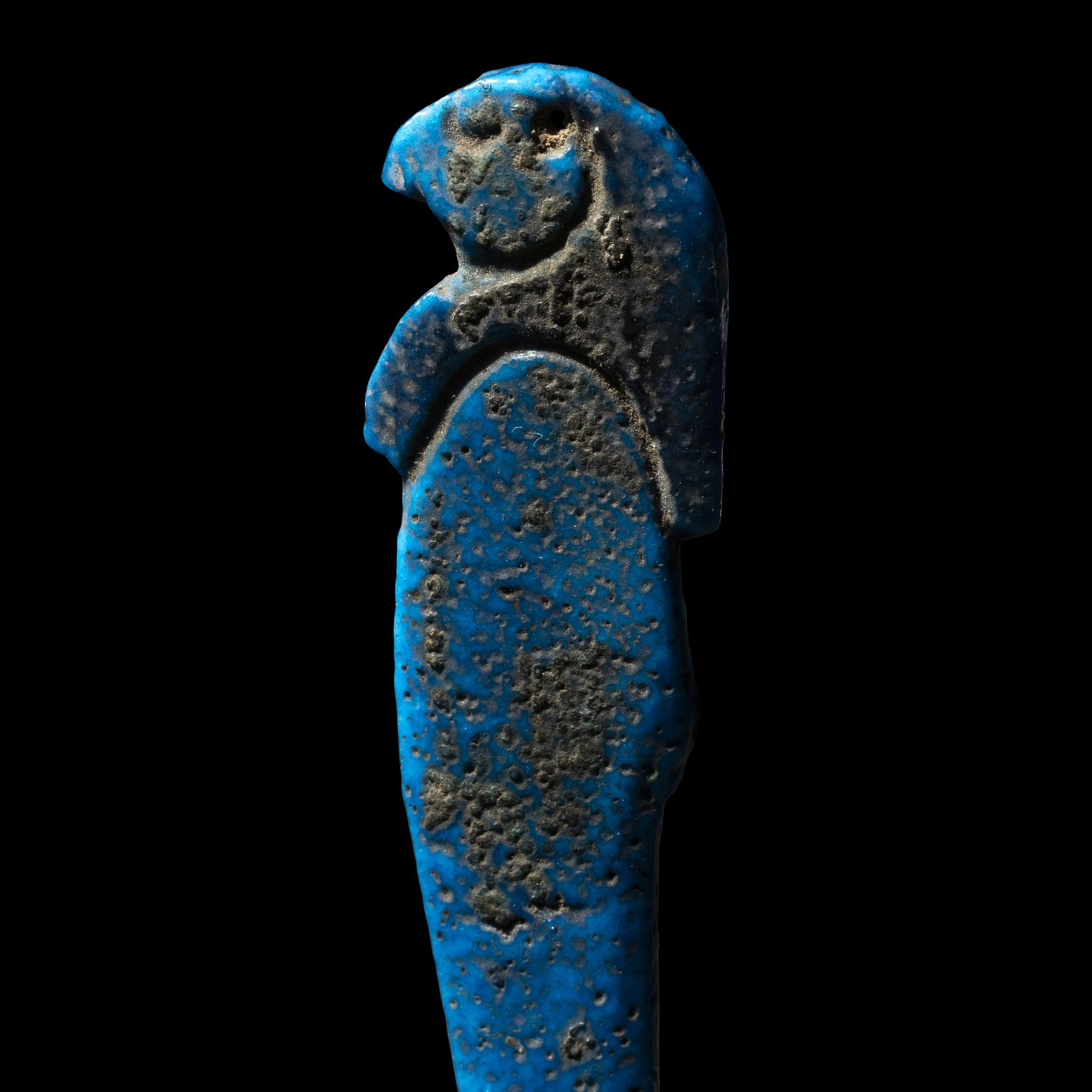 An Egyptian Faience Amulet of a Son of Horus