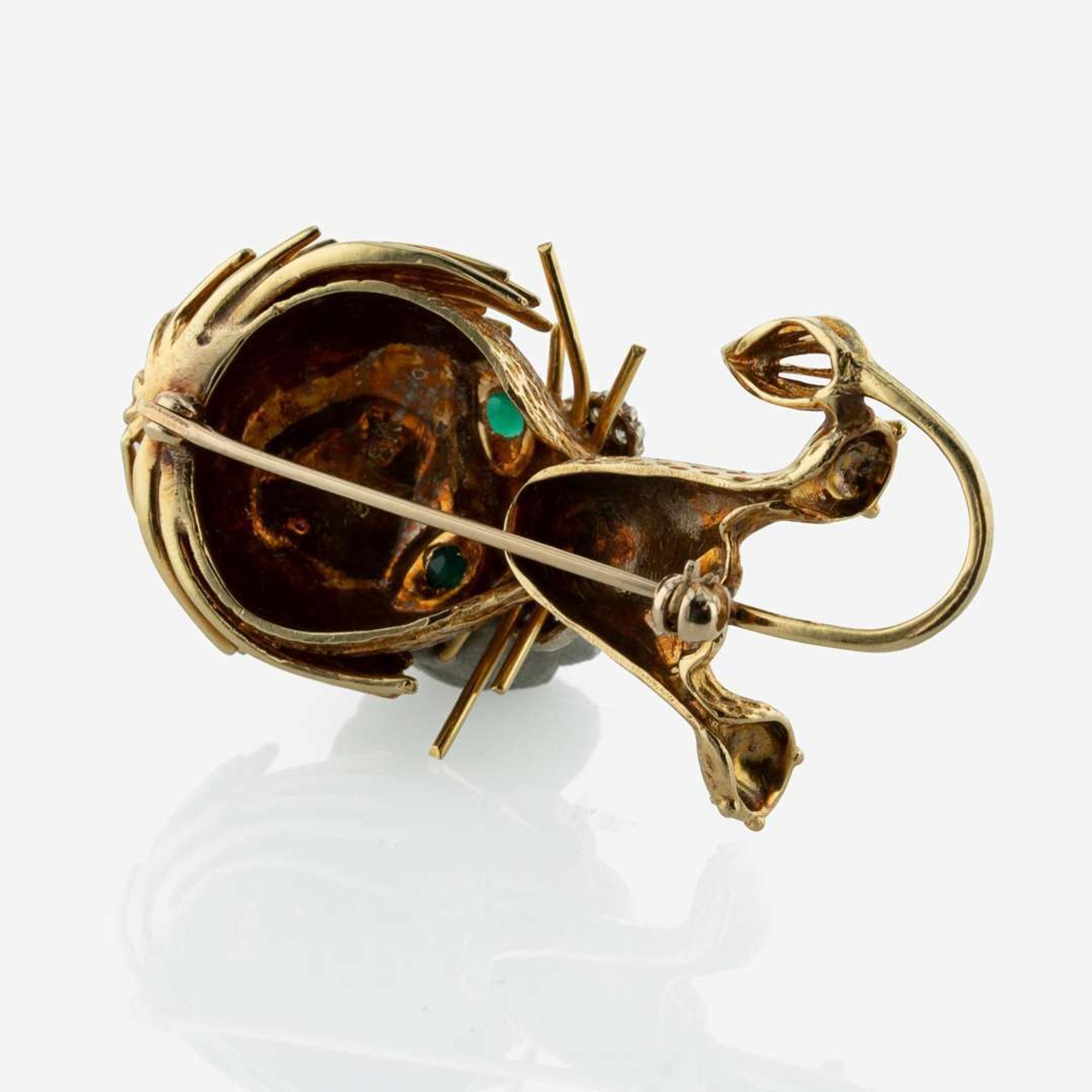 An 18K Yellow Gold and Gemstone Brooch