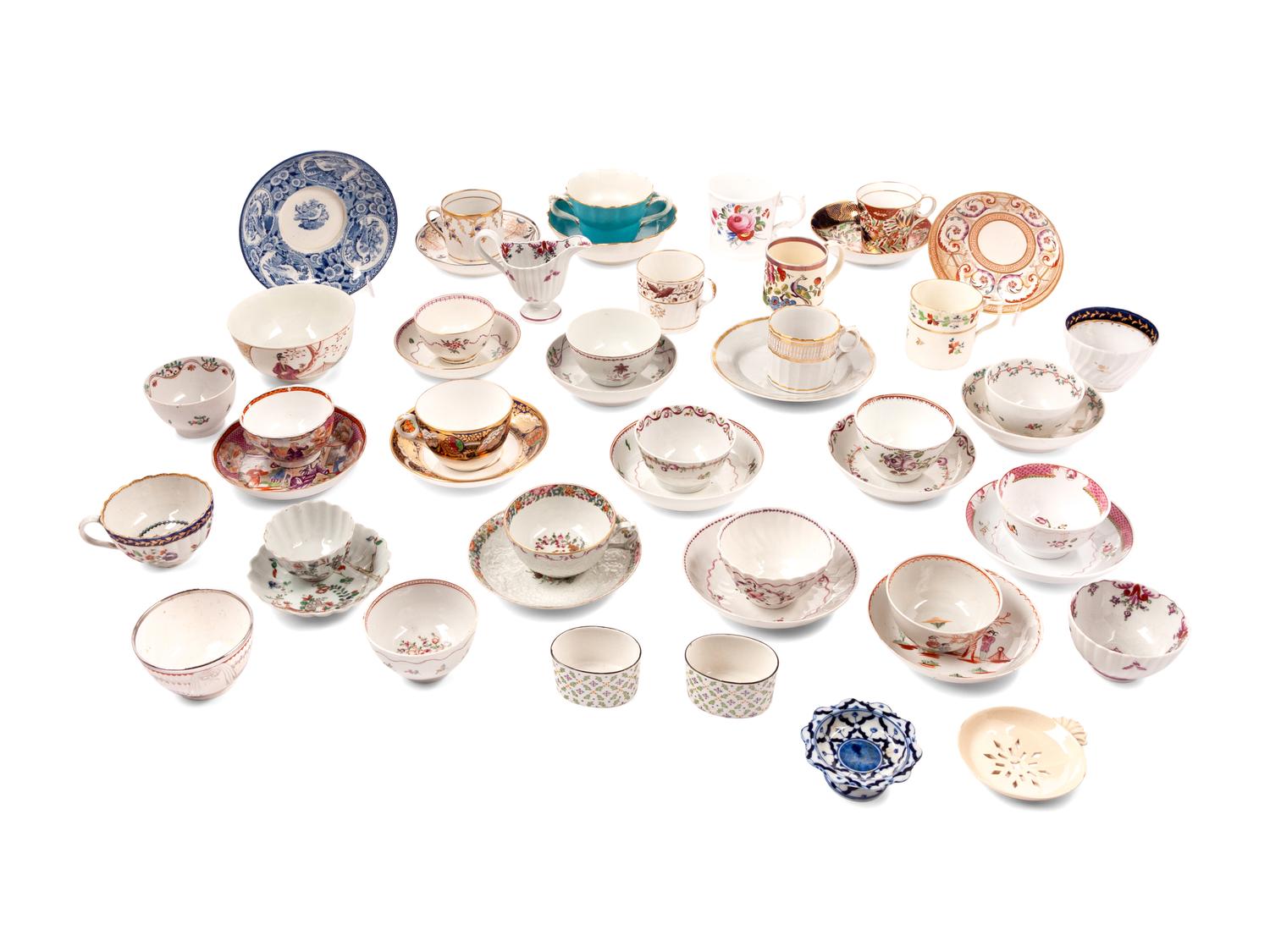 A Large Collection of English Porcelain Teacups and Saucers