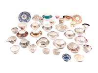 A Large Collection of English Porcelain Teacups and Saucers
