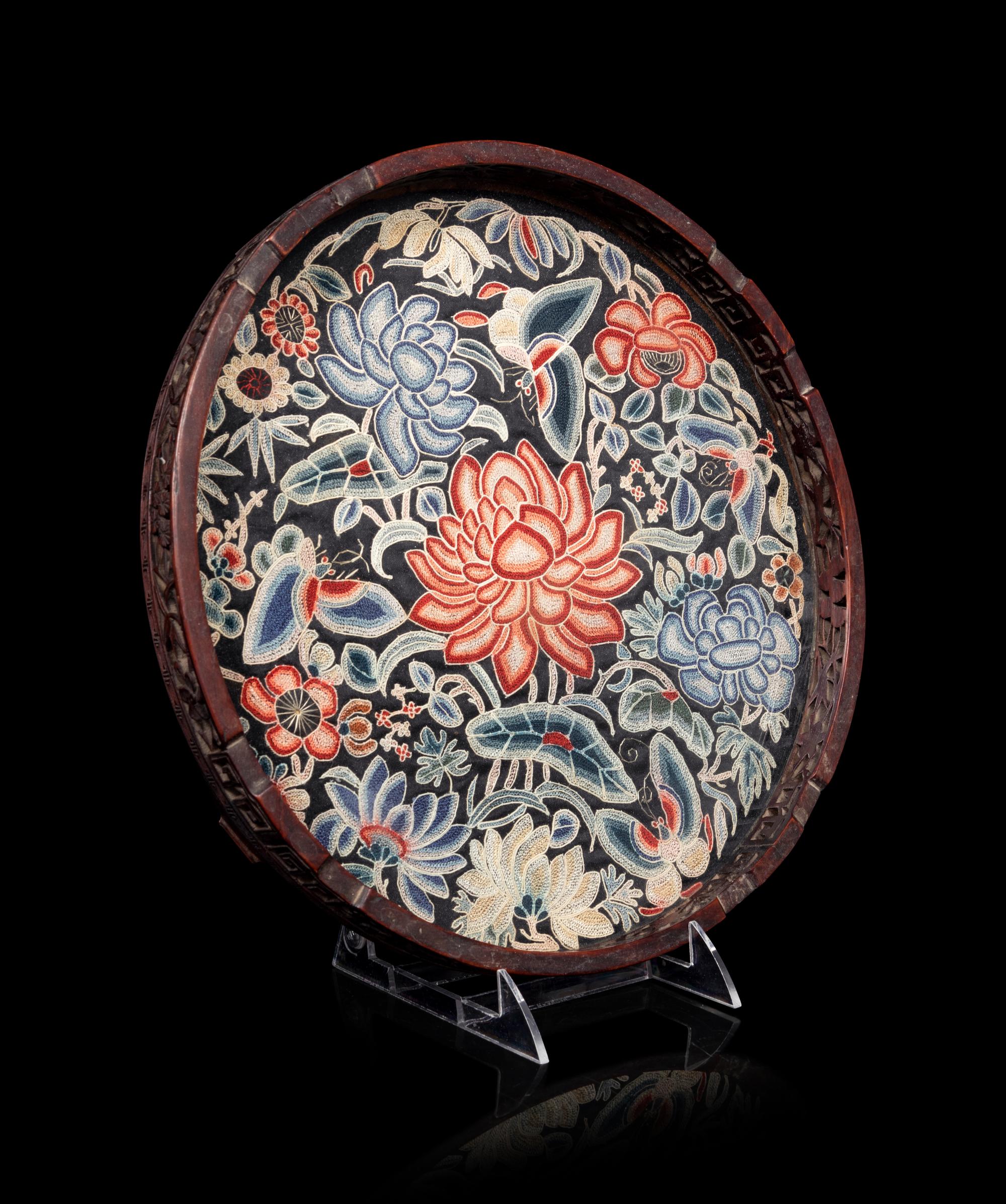 A Chinese Embroidered Silk Inset Hardwood Circular Tray
