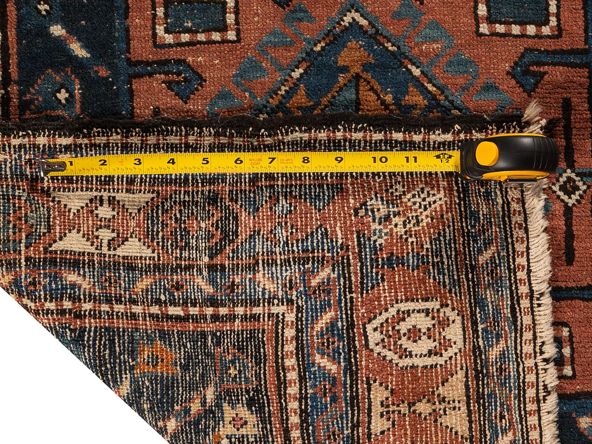 Two Heriz Wool Rugs