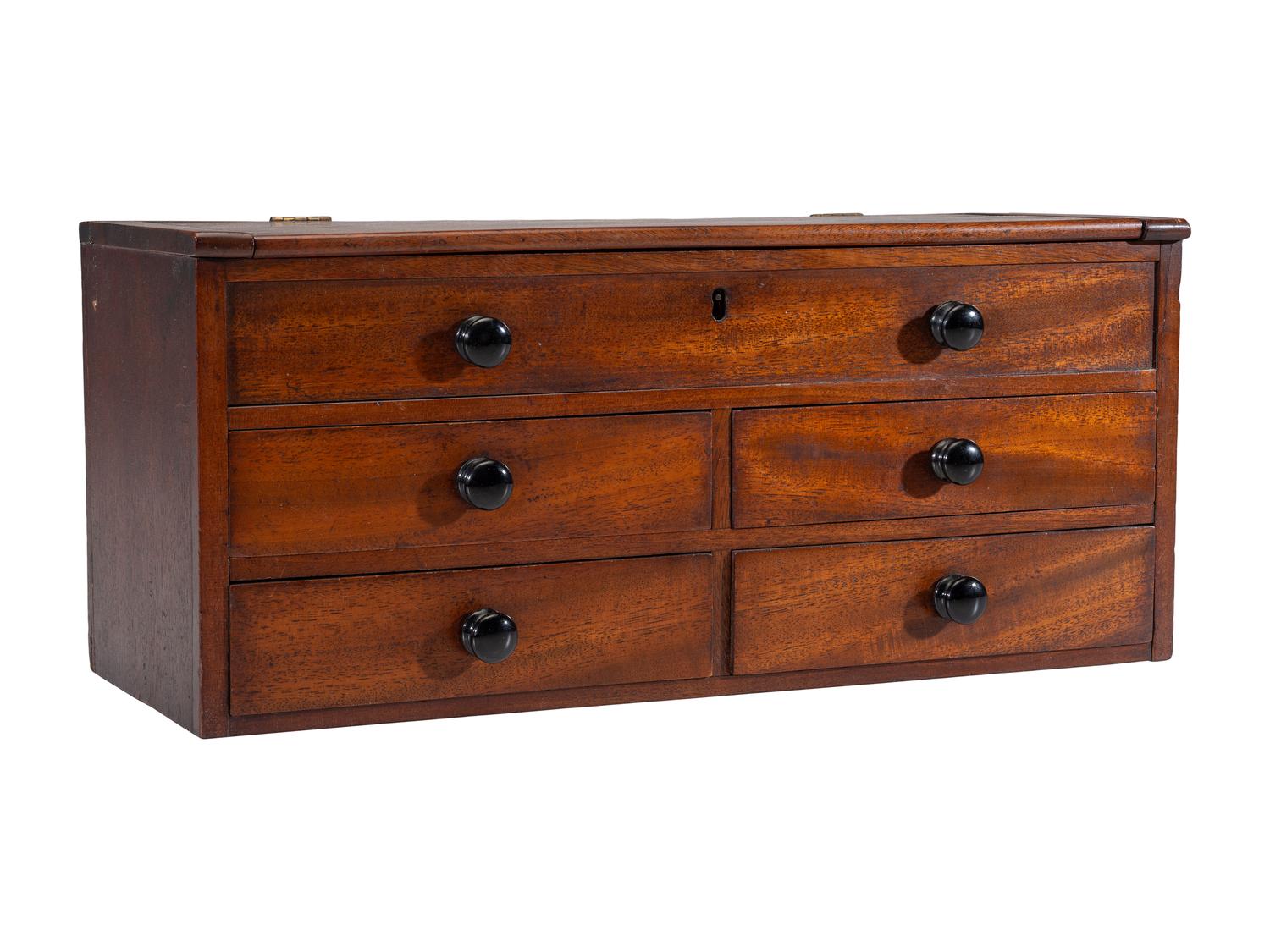 A Miniature Mahogany Tabletop Storage Chest