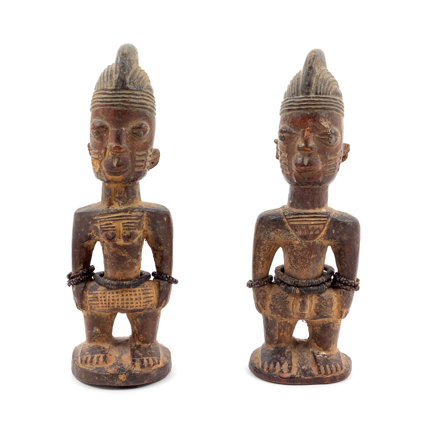 A Pair of Yoruba Twin Ibeji Figures Height 12 inches. — NIGERIA, PROBABLY MID-20TH CENTURY