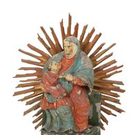 A Group of Eight Carved and Polychromed Santos Figures