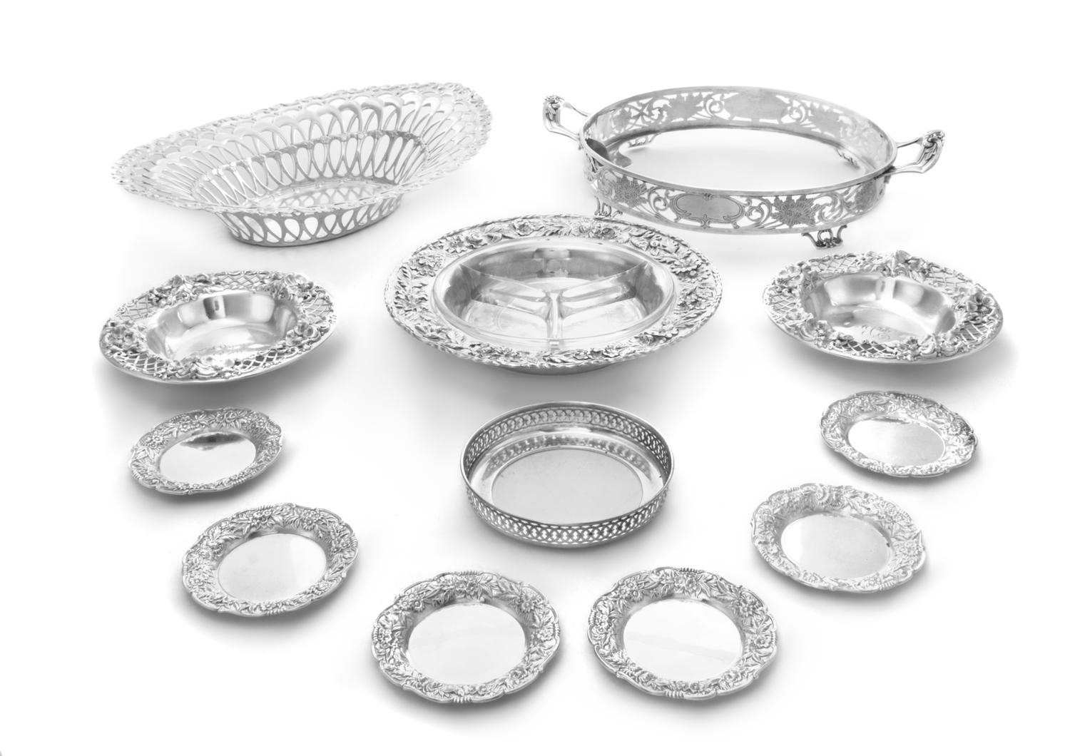 A Collection of American Silver Table Articles, various makers, comprising a reticulated basket, a dish stand, a set of six butter pads