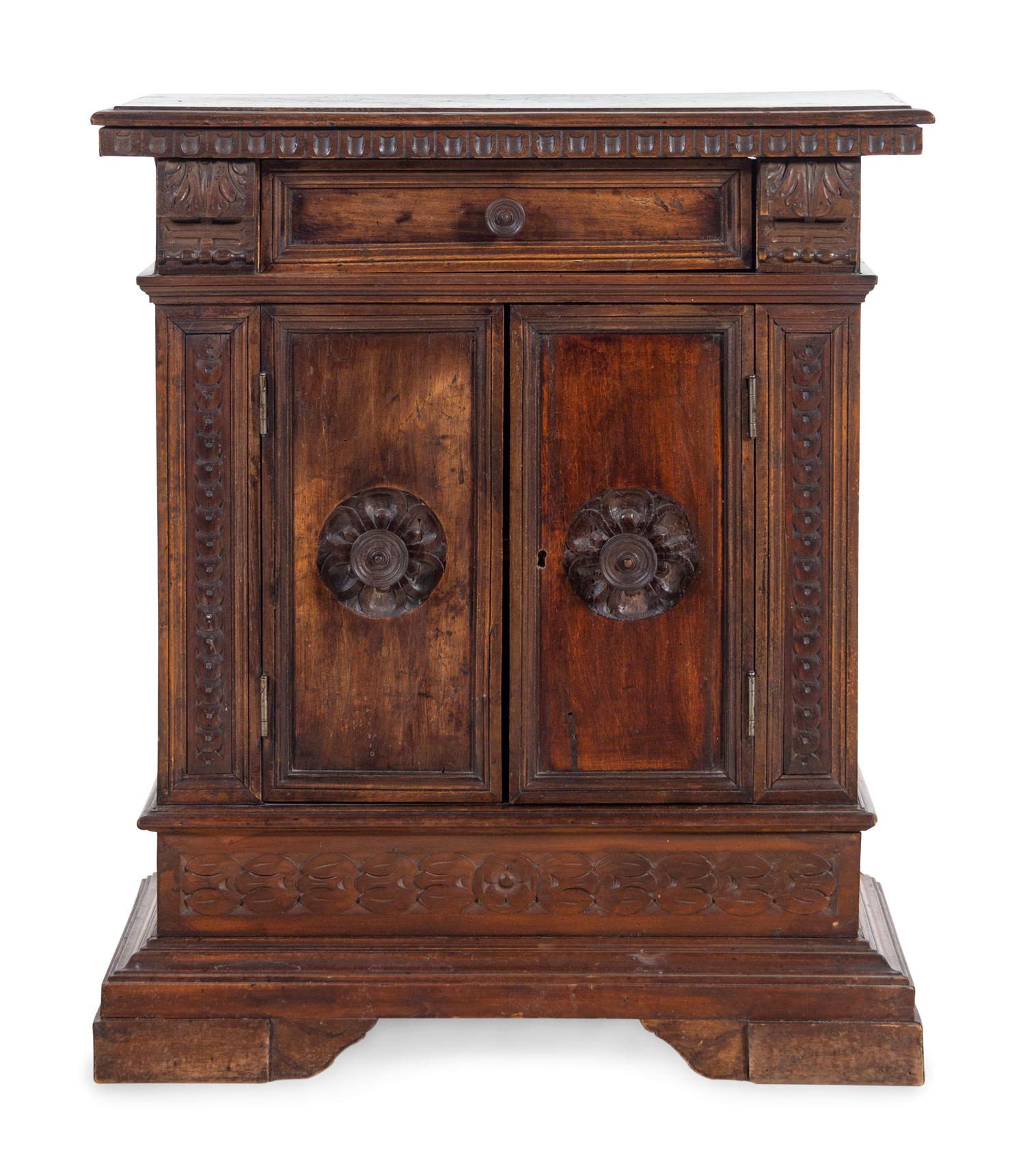 An Italian Baroque Walnut Cabinet