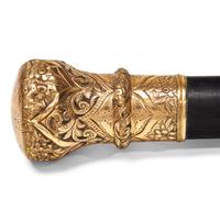 A Presentation Ebonized Wood Walking Stick with Gold-Plated Mount