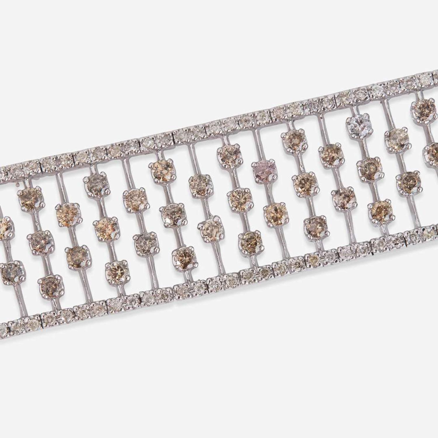 An 18K White Gold, Diamond, and Colored Diamond Bracelet