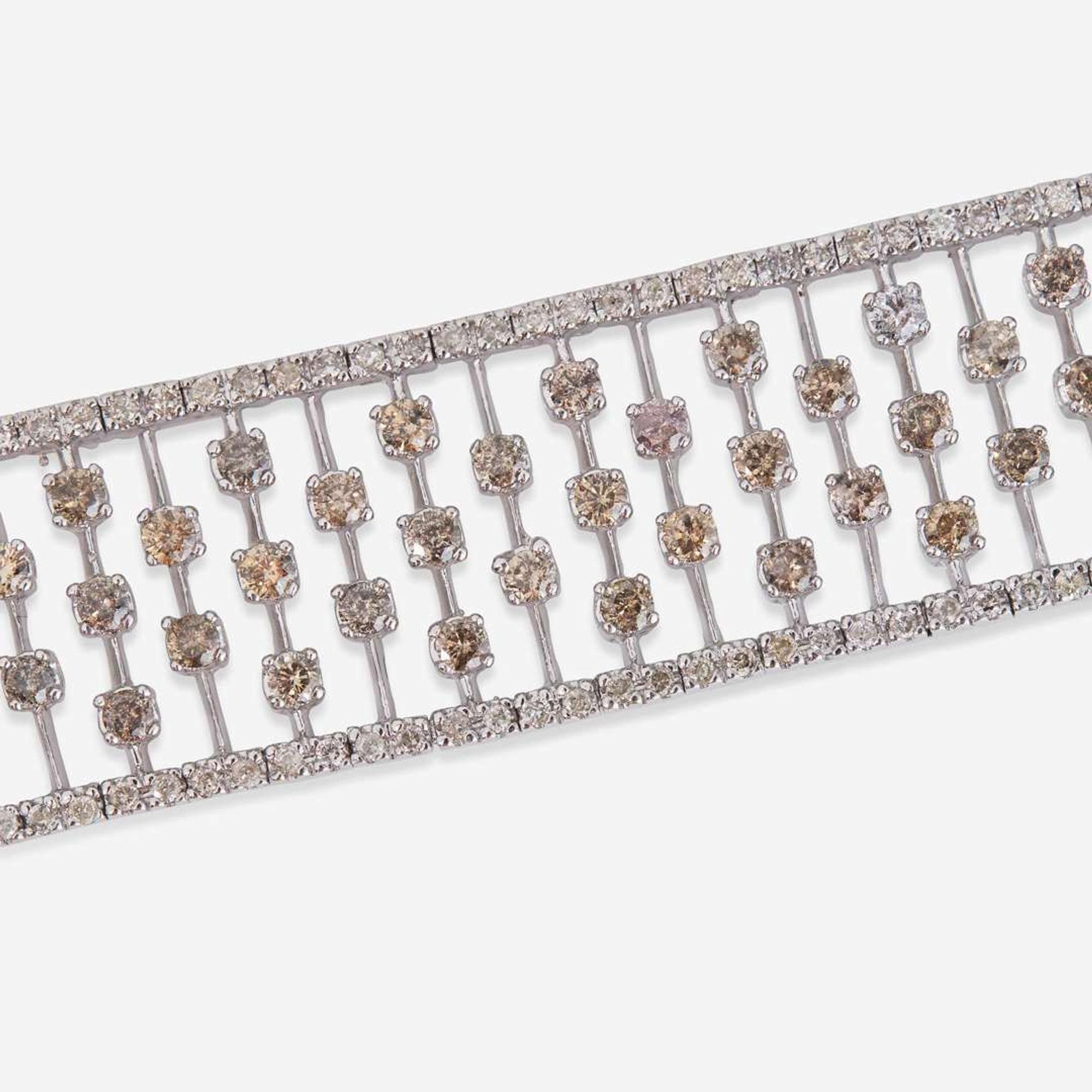 An 18K White Gold, Diamond, and Colored Diamond Bracelet