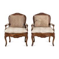 A Pair of Louis XV Style Caned Walnt Fauteuils