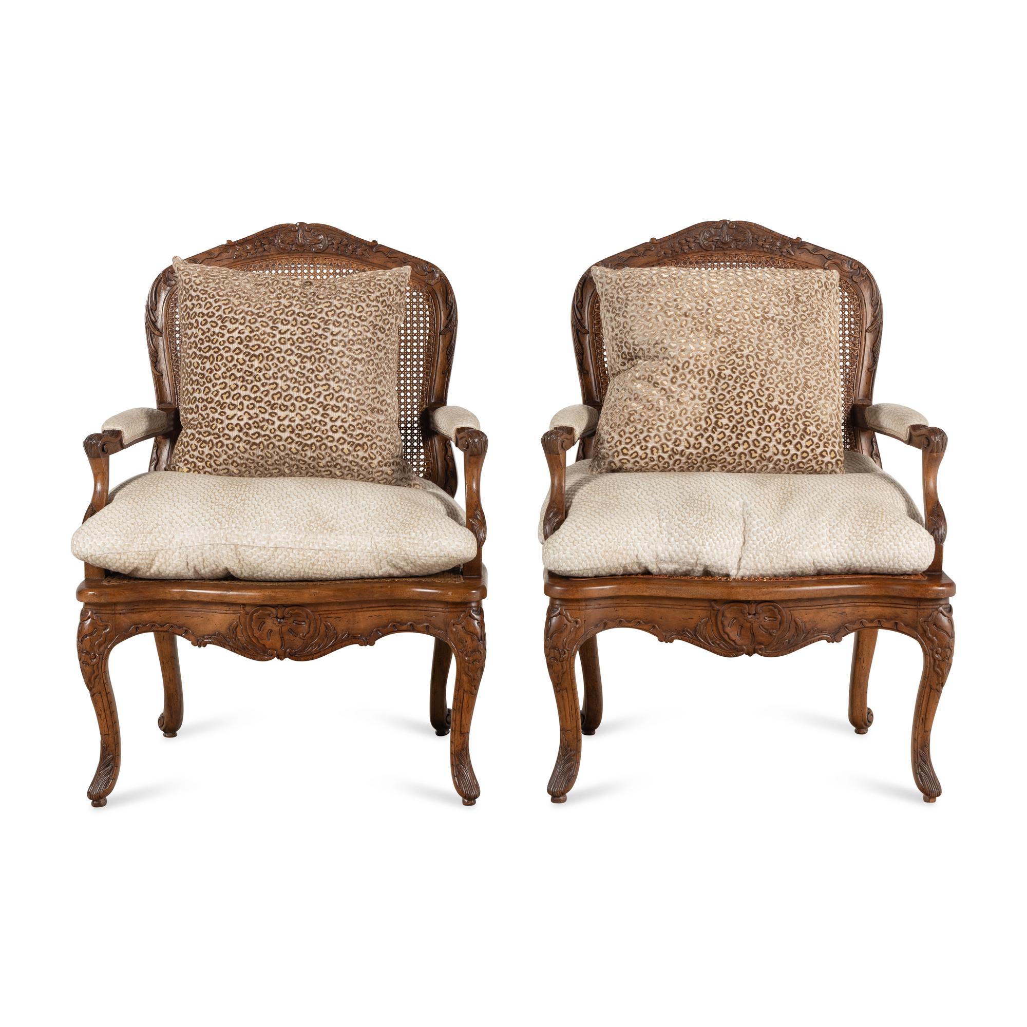 A Pair of Louis XV Style Caned Walnt Fauteuils
