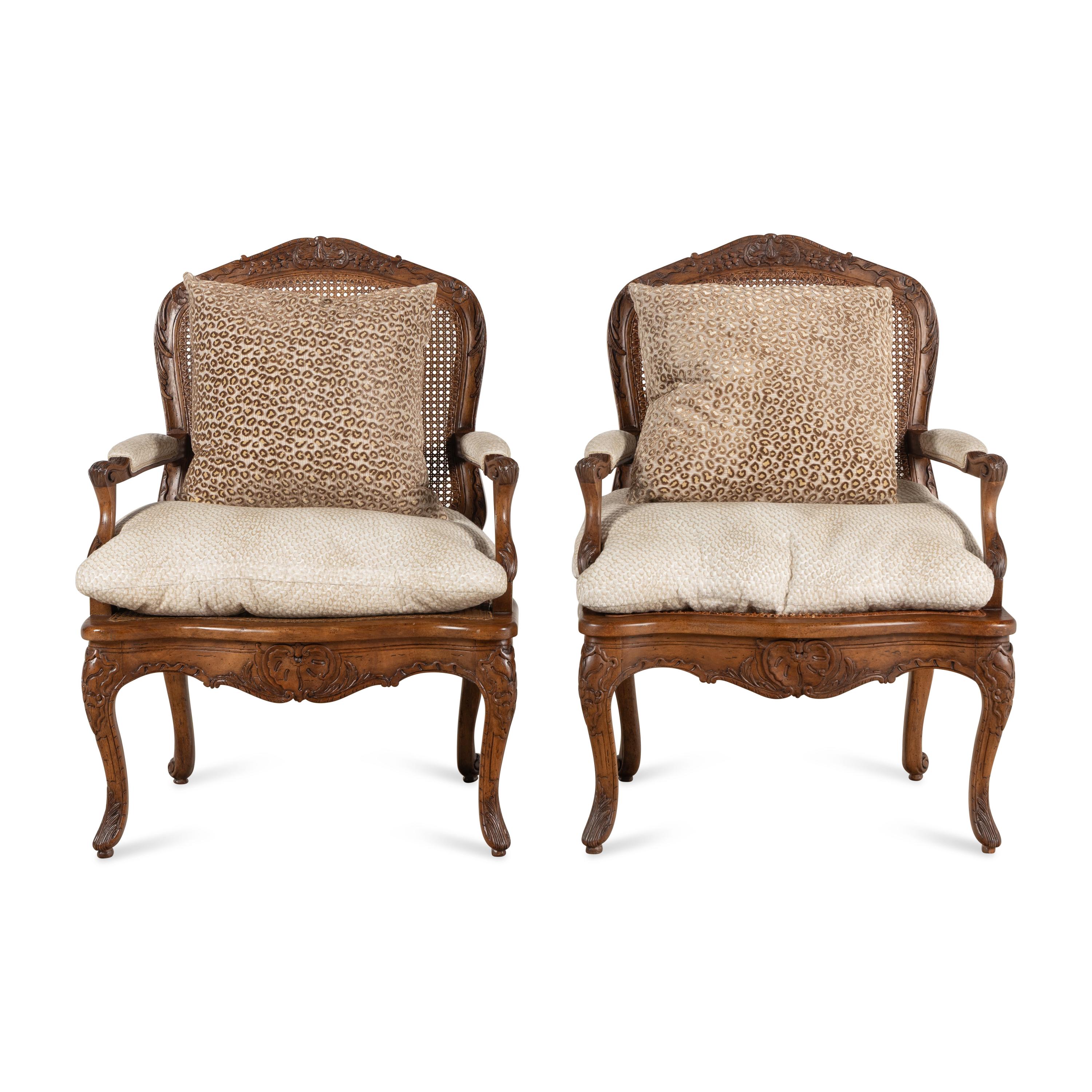 A Pair of Louis XV Style Caned Walnt Fauteuils