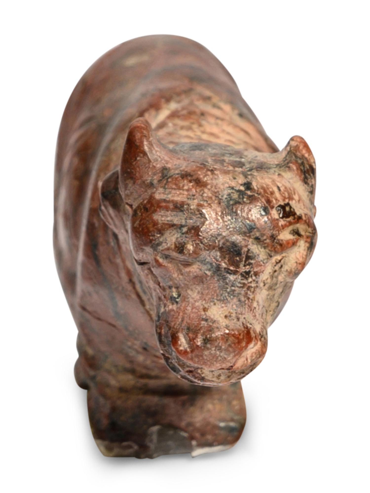 An Egyptian Red Jasper Trussed Cow