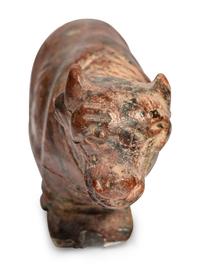 An Egyptian Red Jasper Trussed Cow