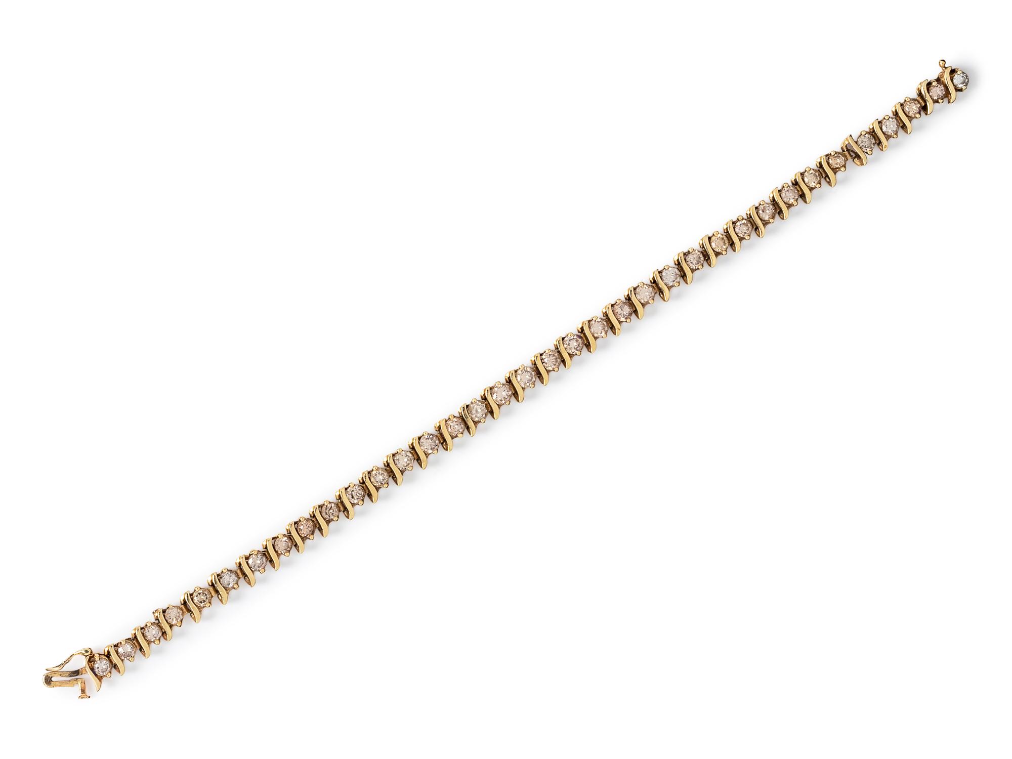 A 14 Karat Yellow Gold and Diamond Bracelet,