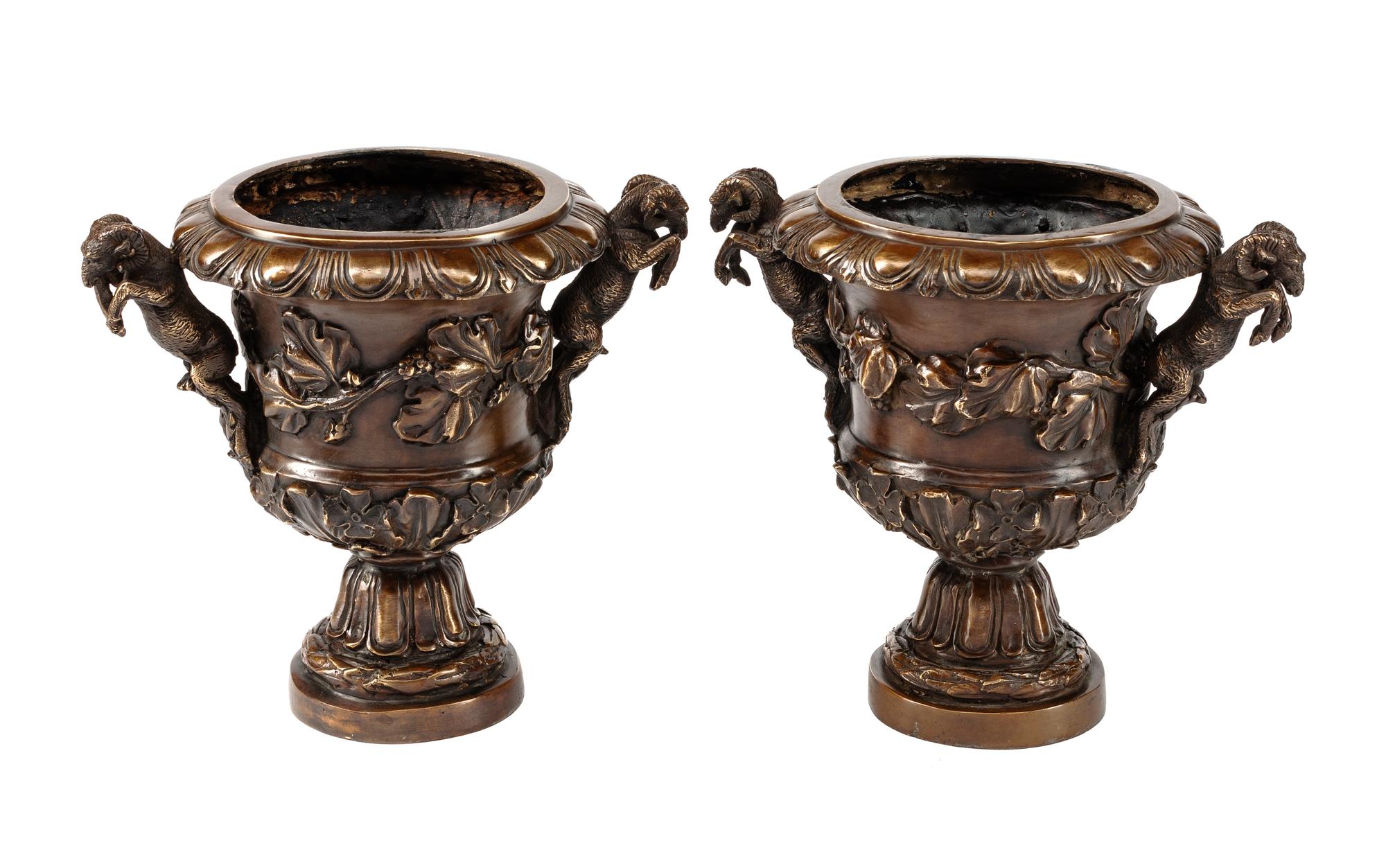 A Pair of Pompeian Style Patinated Bronze Urns