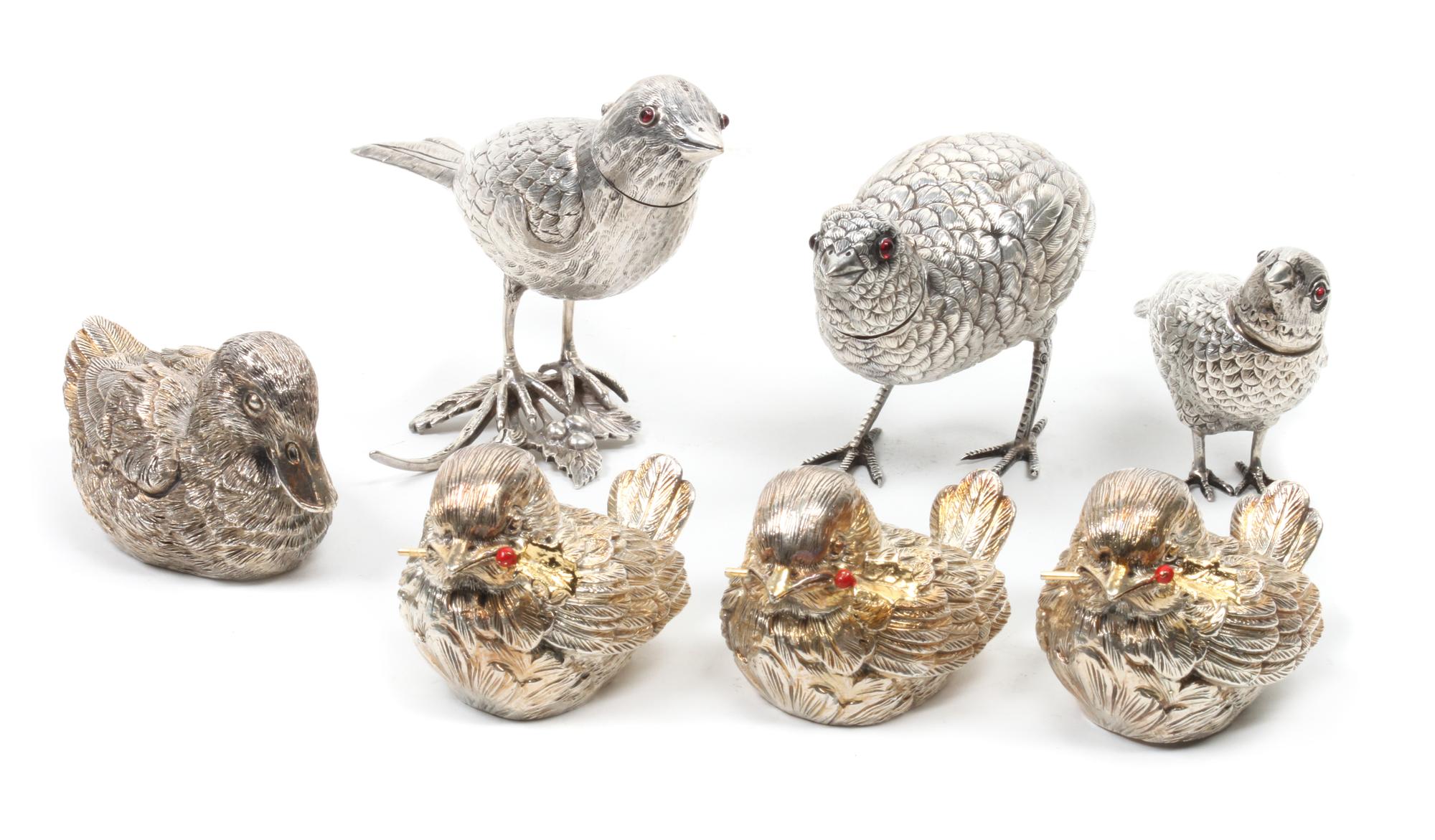 Seven Assorted Silver and Silver Plated Bird Figurines Largest height 3 x width 2 x depth 5 inches.