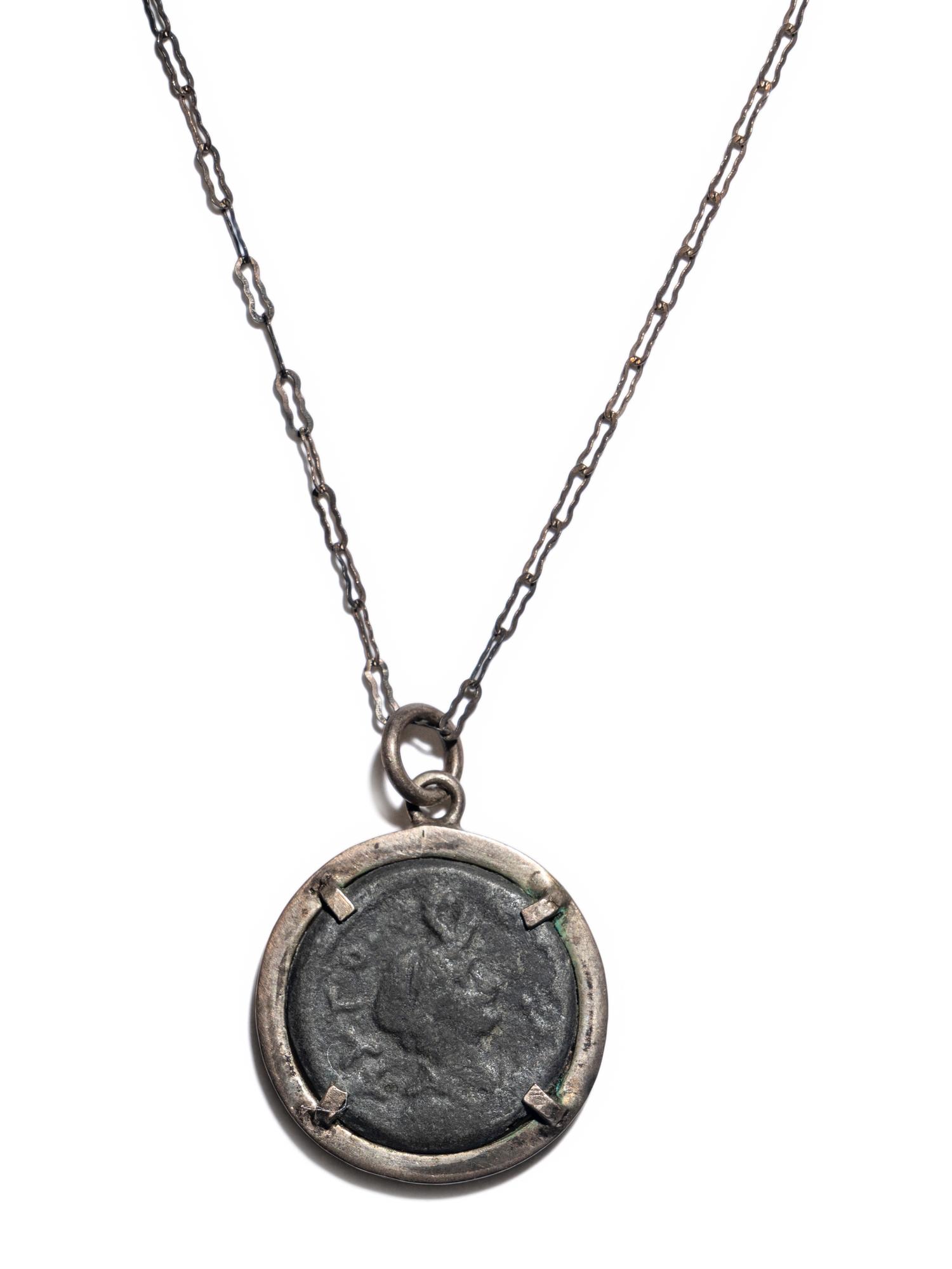 A Roman Bronze Coin set in a Modern Mount and Chain