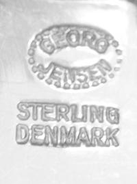 A Danish Silver Flatware Service, Georg Jensen Silversmithy, Copenhagen, Acorn pattern, comprising: 12 dinner knives 12 dinner forks 12
