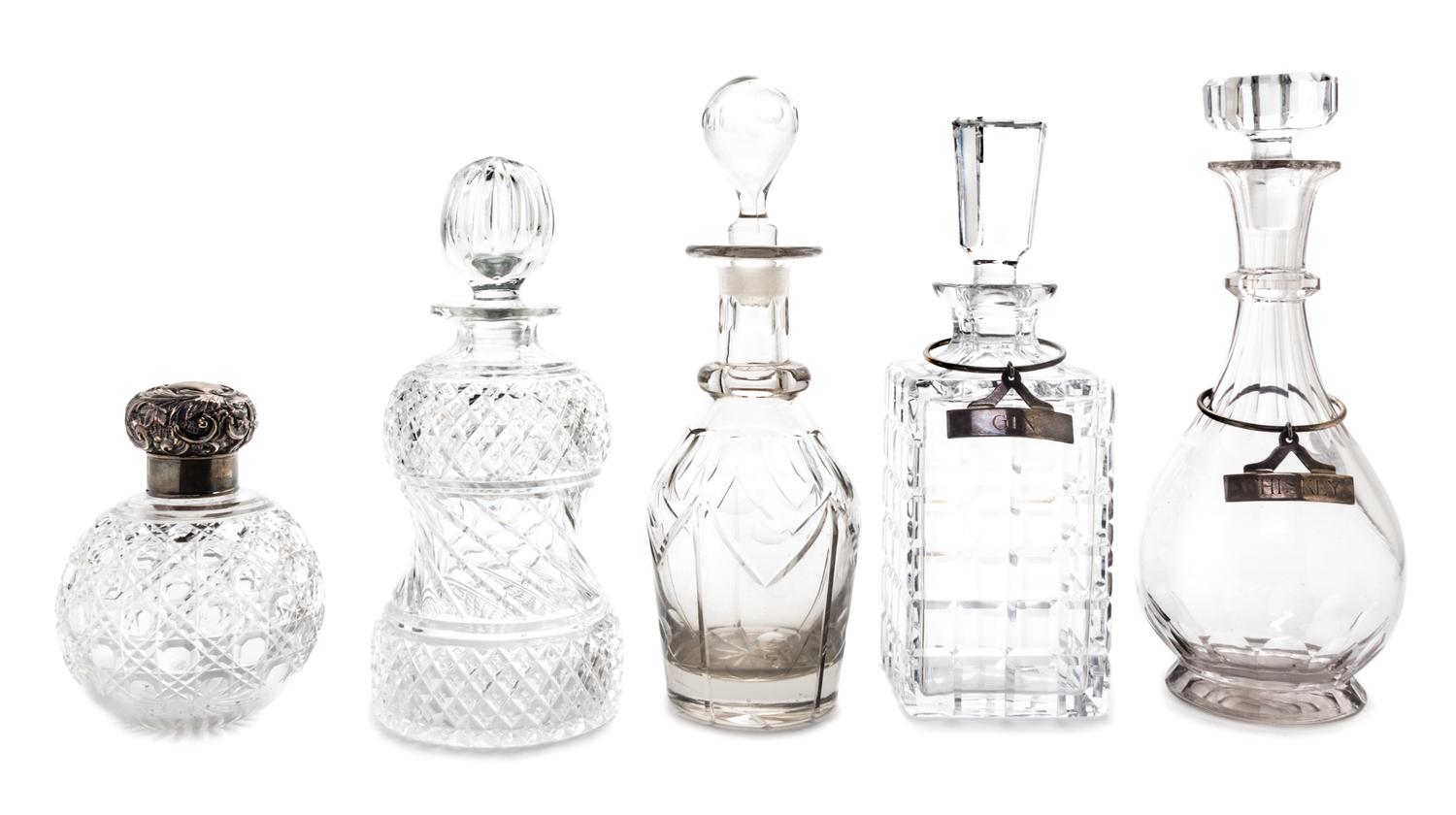 A Collection of Glass Decanters Length of stopper 14 1/4 inches.